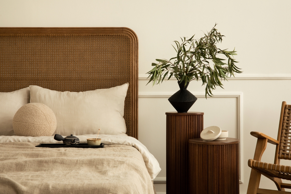 Japandi style accents, including geometric vases, wooden accents, soft textures