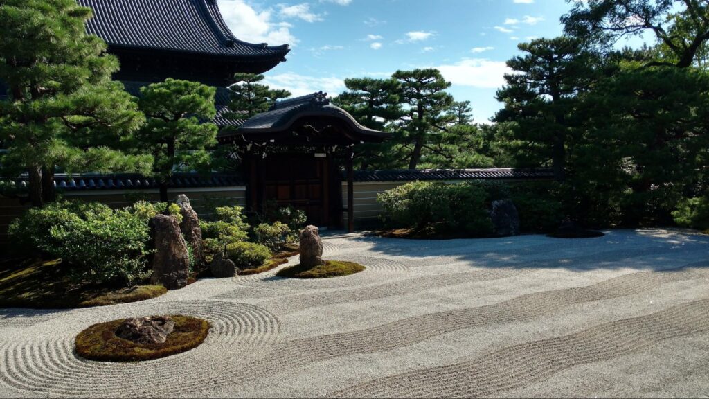 Sand zen garden with sand raked in stripes and circles